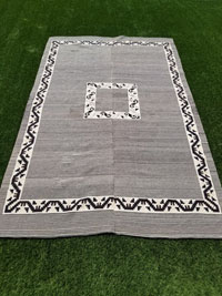 Mexican vintage textiles and serapes, a beautiful classic Saltillo serape (sarape) in the style of a striped Moki with a geometric pyramid style in the center medallion and the border, Mexico, c. 1890-1900. Main photo of the classic Saltillo serape.